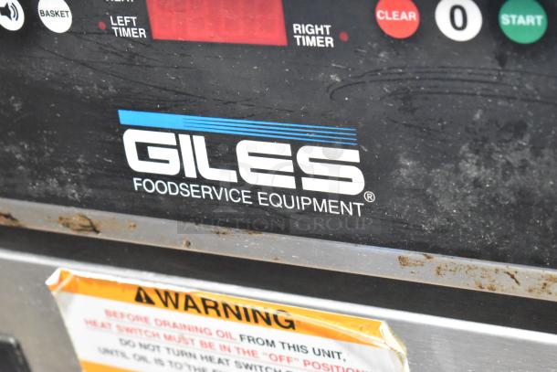 Giles EOF-24 stainless steel 3-bay deep fat fryer with center dumping station, on commercial casters, 480V, 3-phase.