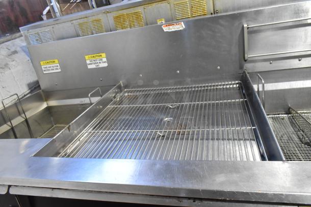 Giles EOF-24 stainless steel commercial electric 3-bay deep fat fryer with center dumping station. 480V, 3-phase.