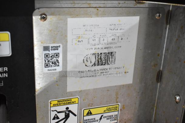 Giles EOF-24 stainless steel 3 bay deep fat fryer with center dumping station and commercial casters. 480V, 3 phase. Serial: 74637-24.