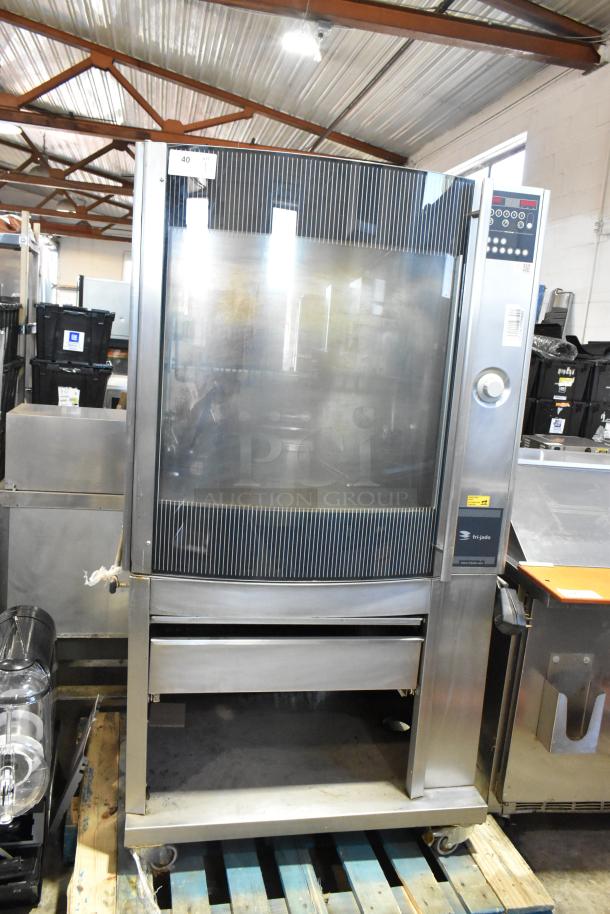 Fri-jado STG7-P stainless steel rotisserie oven on casters, electric, 208V, 3 phase, control panel visible, auction label "40".