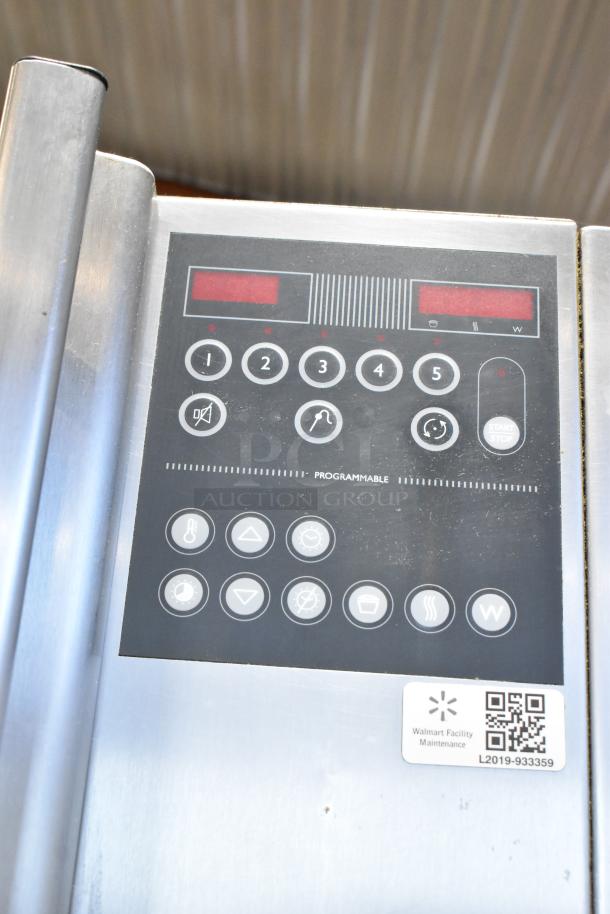 Fri-jado STG7-P rotisserie oven control panel with programmable buttons, stainless steel finish. Visible Walmart maintenance label.