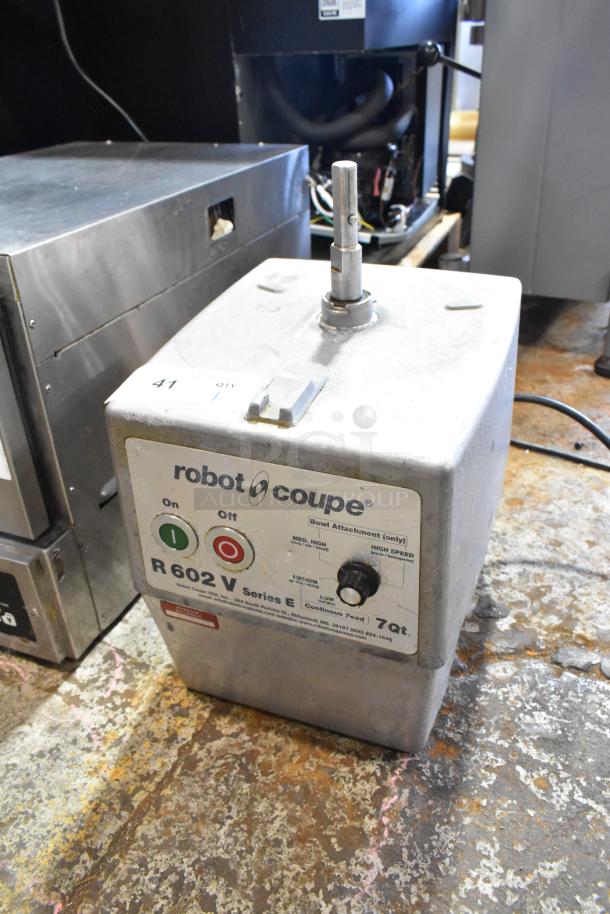 Robot Coupe R602V metal commercial food processor base, 120V, 1 phase, wear visible, labels displaying series, speed settings.