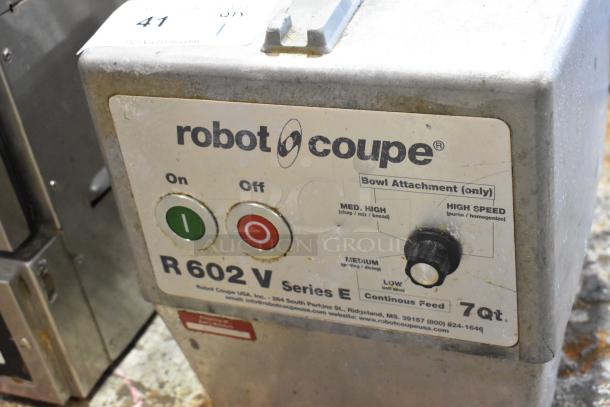 Robot Coupe R602V metal food processor base, 120V, controls visible, moderate wear. Model and specs labeled.