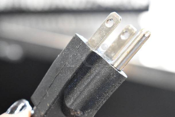 Close-up of a power plug for the Narvon 378WSSM3 frozen beverage machine, showing a standard 115 Volt prong configuration.