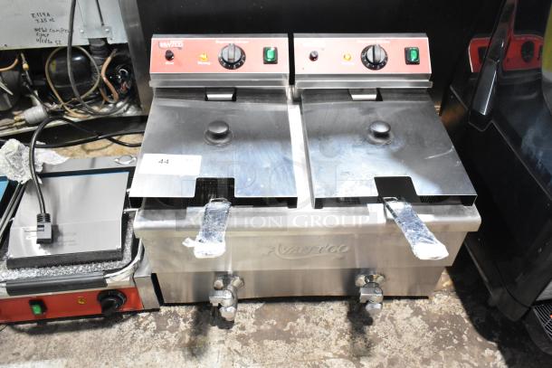Brand new Avantco 177F202 stainless steel 2-bay fryer with metal fry baskets and lids. Scratch and dent condition. 208-240V, 1 phase.