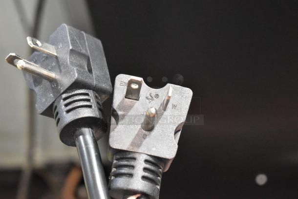 Close-up of power plugs for the 2025 Avantco 177F202 stainless steel commercial countertop fryer, 208-240V, 1 phase.
