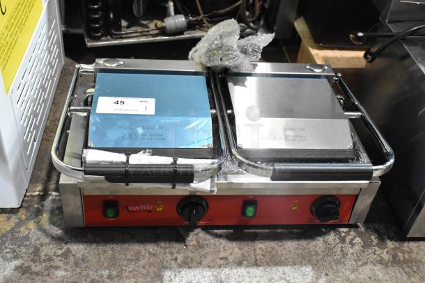 Brand new Avantco 177PG400GS stainless steel double panini press, 120V, 1 phase. Scratch and dent condition. Auction label present.
