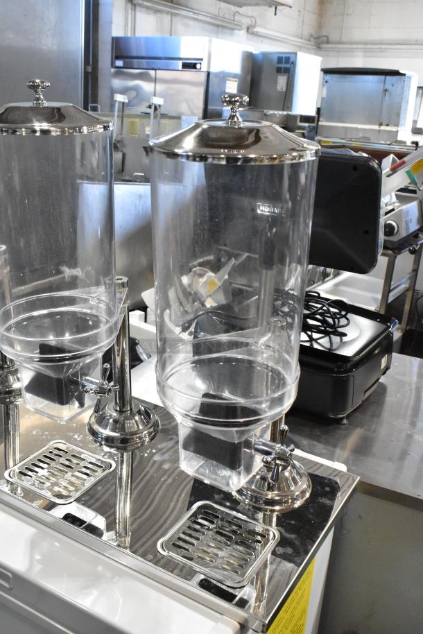 Brand new chrome and clear poly 3-hopper dry goods dispenser, scratch and dent condition, features sturdy build, modern design.