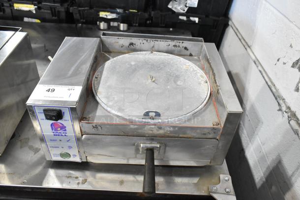 AJ Antunes CM-100 stainless steel cheese melter, 208V, 1 phase, showing wear. Features control panel with label markings.