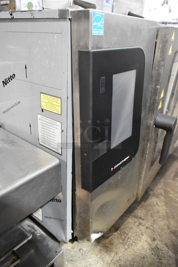 Convotherm stainless steel commercial combi convection oven with visible damage; door does not close. Energy Star label shown.