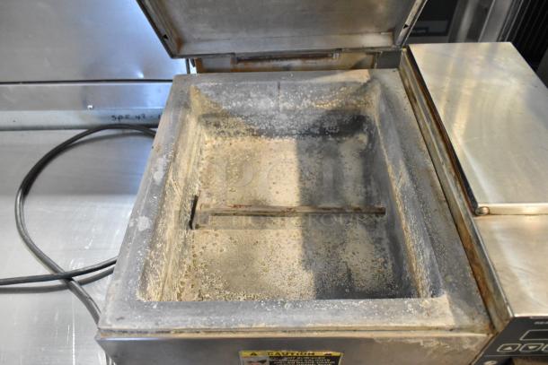 Roundup DFW-150CF stainless steel countertop food warmer, interior showing signs of use. 120V, 1 phase, commercial-grade.