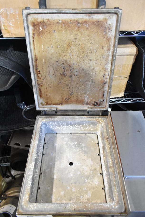 Nemco 6600 stainless steel commercial food warmer, showing interior wear, runs on 120 volts, 1 phase.