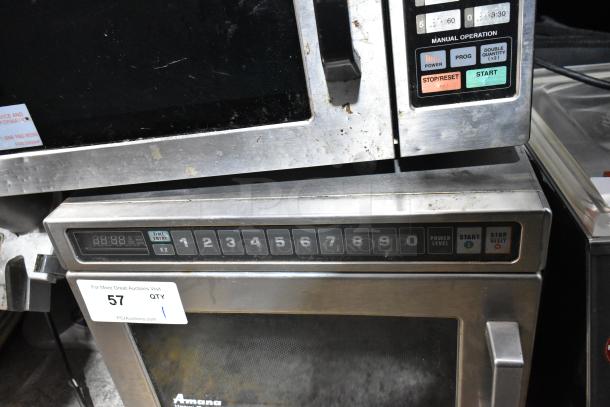 Amana HDC21 stainless steel commercial countertop microwave, keypad interface, visible wear, auction tag shown.