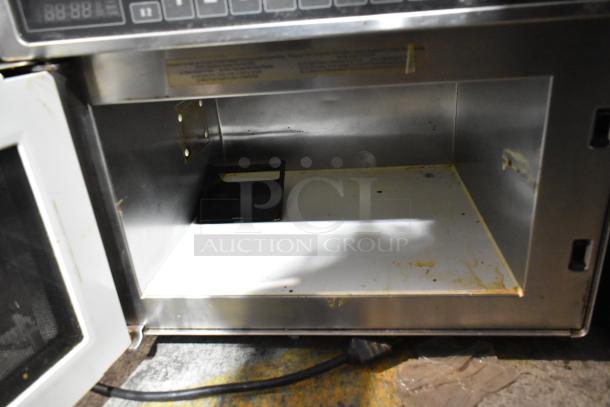 Amana HDC21 stainless steel commercial countertop microwave oven, 208/230 volts, 1 phase, interior view, used condition.
