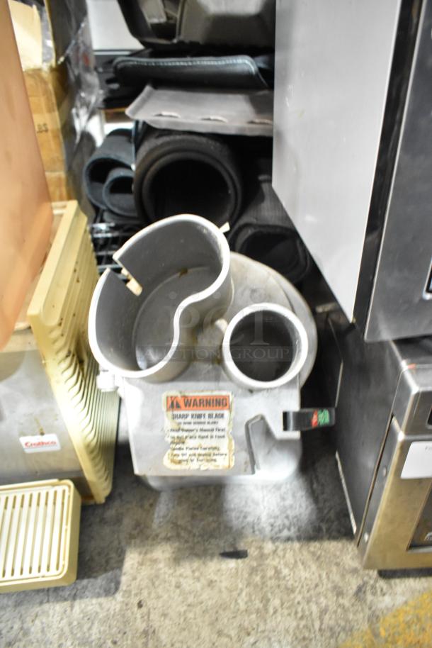 Globe GFP500 metal commercial countertop food processor in used condition. Features 115 volts, 1 phase with warning labels visible.