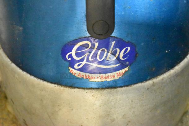 Globe GFP500 metal commercial countertop food processor, visible wear, 115 volts, Swiss-made by Anliker label.