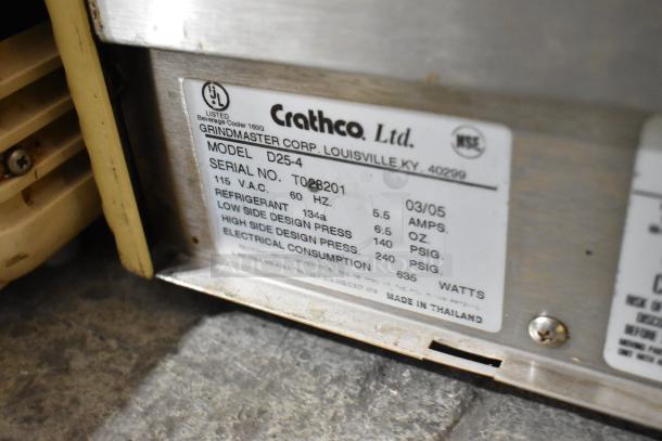 Crathco D25-4 metal beverage machine label showing specs: 115V, 1 phase, model D25-4, serial TQ8201, made in Thailand.