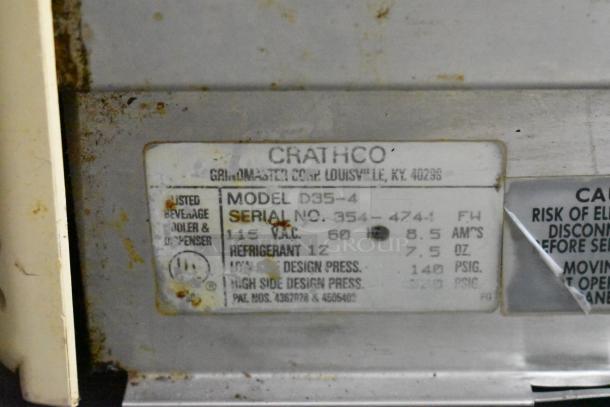 Crathco D35-4 metal beverage machine label showing model, serial number, 115 volts, and refrigerant info.