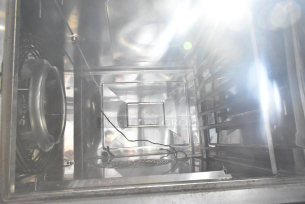 Interior view of a Rational iCombiPro convection oven, stainless steel, model LM100CE.AXXXX/LM100EE.AXXXX, electric, 440/480V, 3 phase.