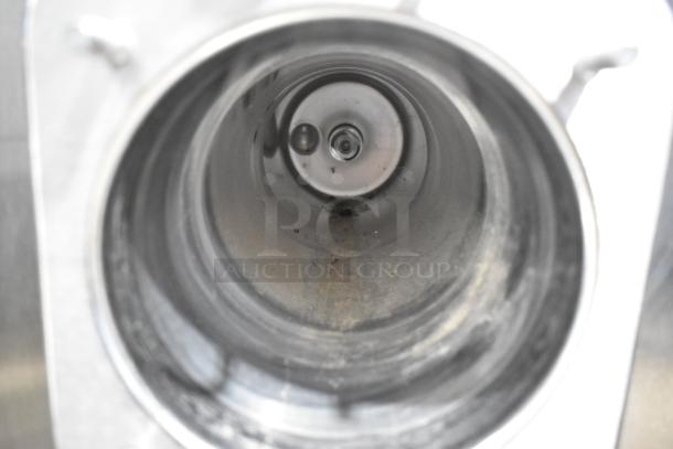Internal view of Taylor 340-27 stainless steel frozen beverage machine cylinder, showing smooth metal surfaces.