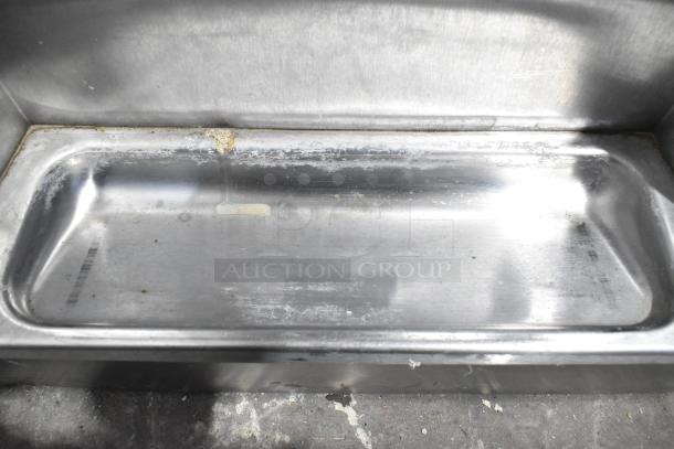 Taylor 340-27 stainless steel countertop frozen beverage machine, visible wear, 208-230V, 1-phase, commercial use.
