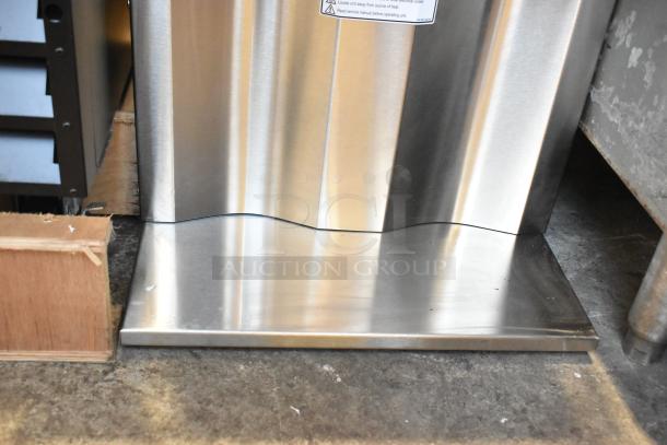 Stainless steel base of Curtis D1000GT63A000 coffee machine with clear label; commercial use; good condition.