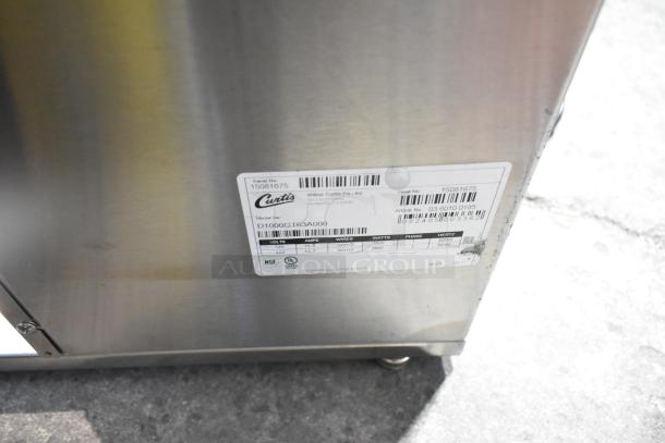 Curtis D1000GT63A000 stainless steel commercial double coffee machine with hot water dispenser, two brew baskets, 120/220V.