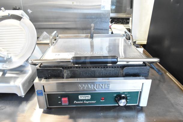 Waring WDG250 Stainless Steel Panini Press, commercial countertop model, 120 volts, 1 phase, with control dial and switch.