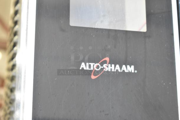 Alto Shaam AR-7T rotisserie oven logo on stainless steel panel, commercial-grade, 208V, 1 phase.