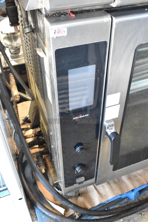 2019/2020 Alto Shaam AR-7T stainless steel electric rotisserie oven, 208V, 1 phase, commercial use. Model label visible.