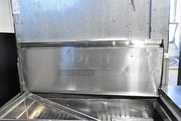 Turbo Air TPR-67SD-D4 Stainless Steel Pizza Prep Table with 4 drawers, 115V, commercial use, minor surface wear.