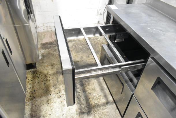 Turbo Air TPR-67SD-D4 stainless steel pizza prep table, 4 drawers, 115V, 1 phase, excellent condition.