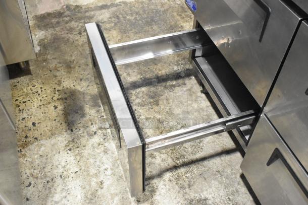 Turbo Air TPR-67SD-D4 stainless steel pizza prep table with open drawer, commercial use, 115 volts, 1 phase.