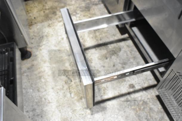 Turbo Air TPR-67SD-D4 stainless steel pizza prep table with open drawer, 115V, 1 Phase, commercial use.
