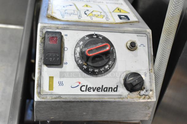 Cleveland Metal Commercial Tilting Braising Pan, showing control panel, temperature dial, and Cleveland branding. Some wear visible.