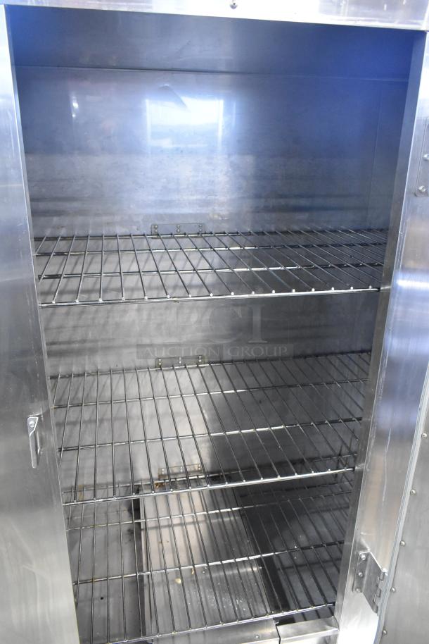 CresCor EB150 stainless steel heated holding cabinet, commercial casters, 120V, 1 Phase, interior shelves visible.