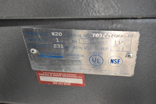 Metal label on Varimixer W20 Commercial 20 Qt. Dough Mixer, showing model, voltage, NSF, and UL certifications.