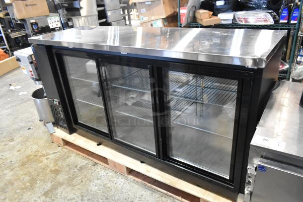 Avantco 178UBB72SHC 73" black bar refrigerator with glass doors, LED lighting, 115V, 1 phase, on a warehouse floor.