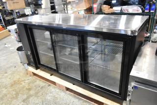 Avantco 178UBB72SHC 73" black bar refrigerator with glass doors, LED lighting, 115V, 1 phase, on a warehouse floor.