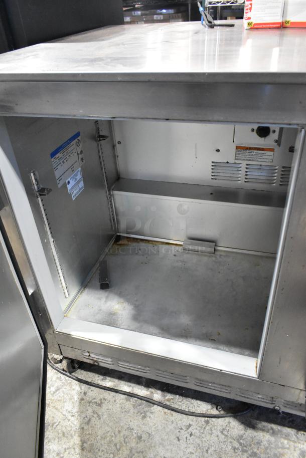 Beverage Air UCR48A stainless steel 2-door undercounter cooler on casters, open interior view, commercial use, model details visible.