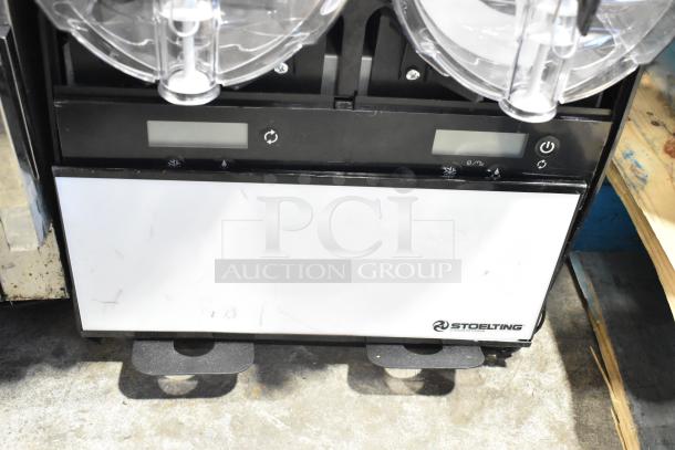 Stoelting SCBF128-37 commercial frozen beverage machine, 2.6 gal capacity, metal, 115V, double dispenser, slight wear visible.