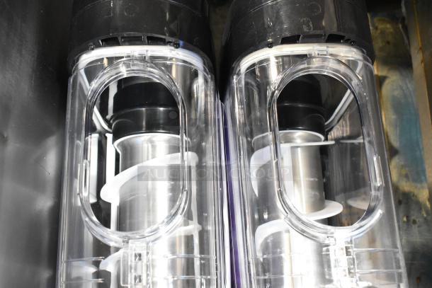 Stoelting SCBF128-37 metal commercial double 2.6-gallon frozen beverage machine, clear compartments, excellent condition.