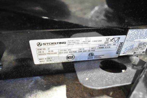 Stoelting SCBF128-37 label on metal commercial double 2.6-gallon frozen beverage machine showing model, voltage, and certifications.