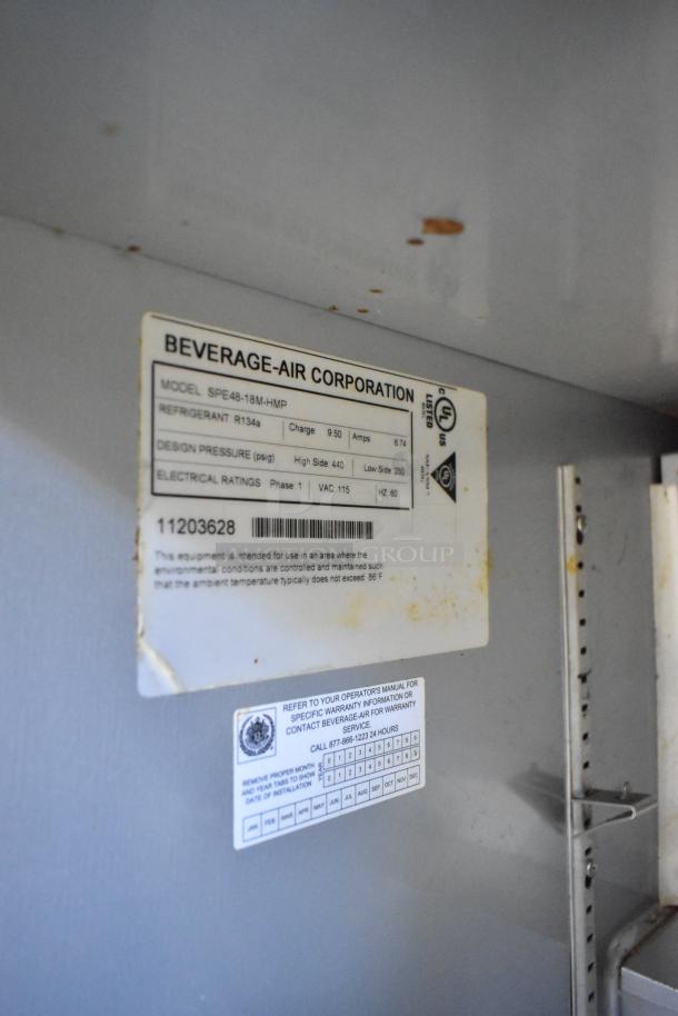 Beverage Air SPE48-18M-HMP prep table label; lists model, 115V, Phase 1. Shows usage and maintenance instructions.