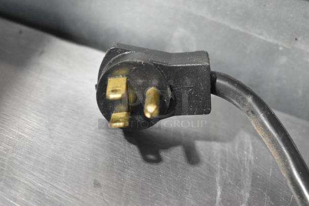Beverage Air UCR48A Stainless Steel Cooler plug detail, showing standard 115V, 1-phase connection on a sleek metallic surface.