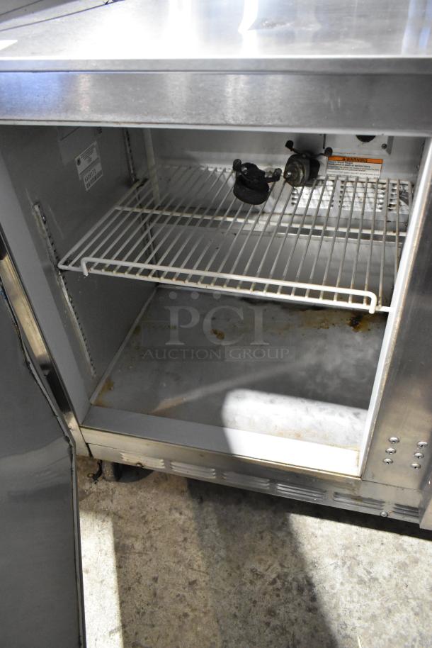 Beverage Air UCR48A stainless steel 2-door undercounter cooler, features commercial casters, 115V, 1 phase, interior view.