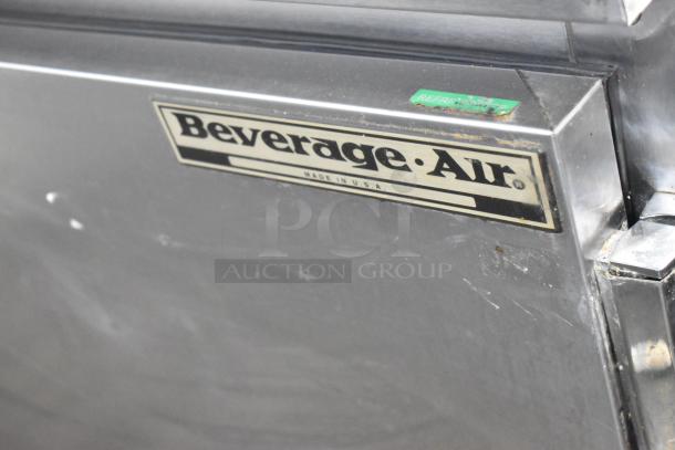 Beverage Air WTR60A stainless steel 2-door undercounter cooler on casters, model label visible, 115 volts, 1 phase.
