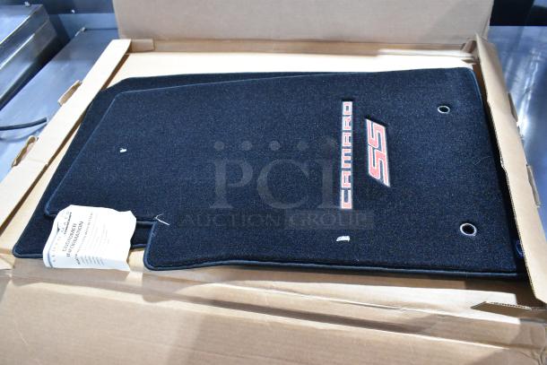 Set of brand-new scratch and dent Lloyd Mats car mats for Camaro SS. Includes original packaging and labels.