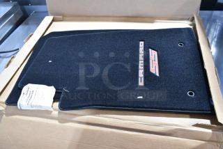 Set of brand-new scratch and dent Lloyd Mats car mats for Camaro SS. Includes original packaging and labels.
