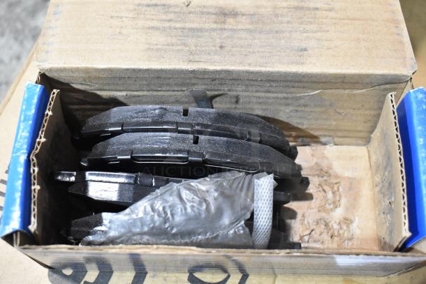 Box containing set of brand new Hawk brake pads models HB275F.620, HB370 F.559, HB299 P.650, with minor box wear.